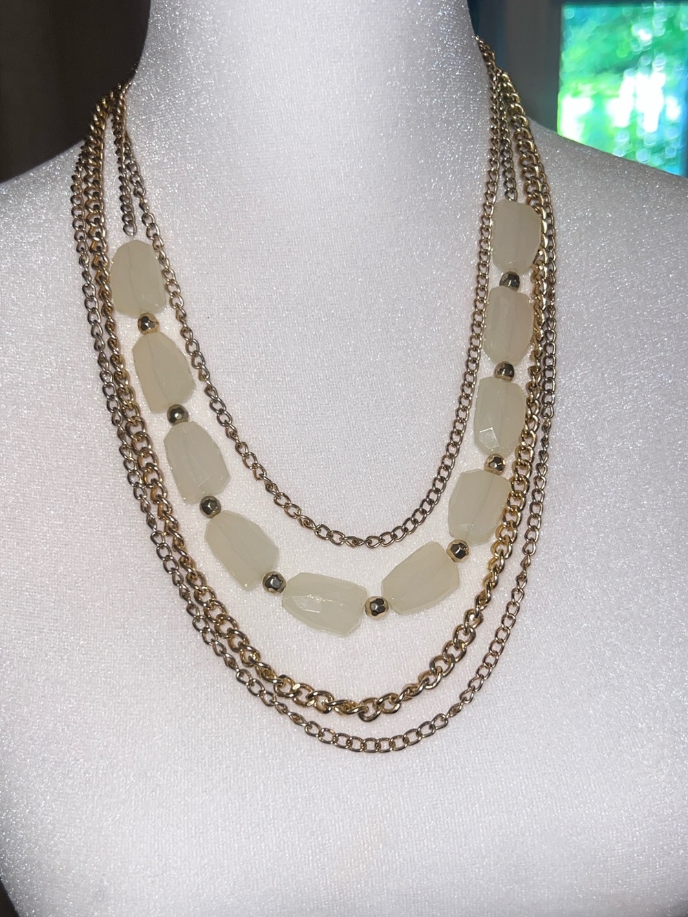 Gold Multi-Strand Necklace with Cream Beads
